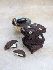 Stack of chocolate brownies with cookies and cream biscuit filling, vegan and gluten free, postal boxes