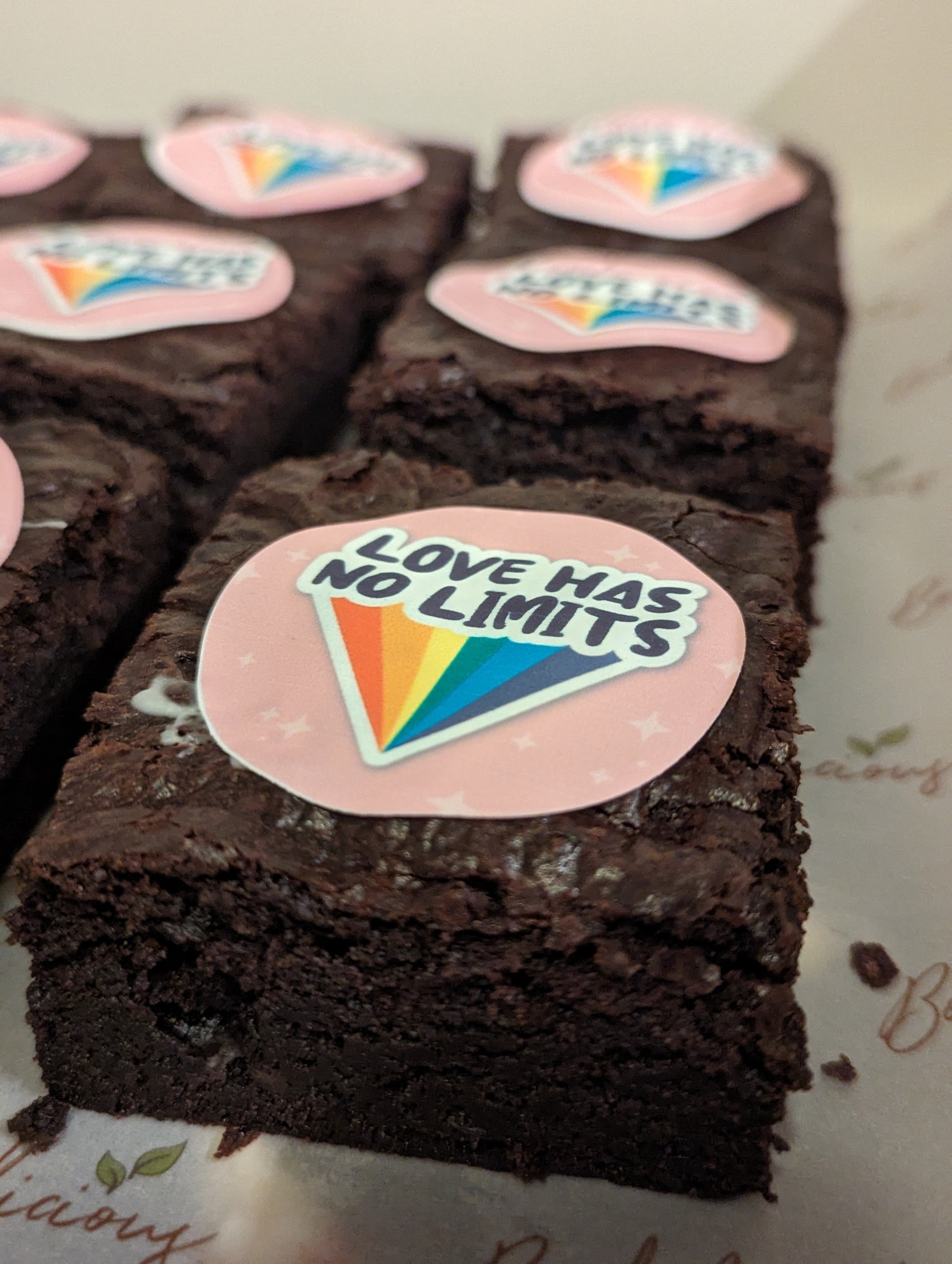 Brownies with 'Love Has No Limits' edible image on top
