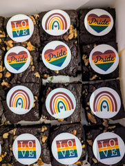 Brownies with Pride-themed edible images featuring rainbows and hearts.